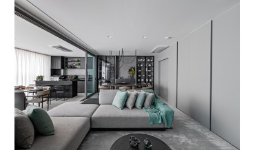 Apartamento monocromático traz atmosfera aconchegante e muito charme